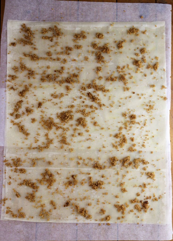 Spreaded breadcrums on a phyllo sheet.